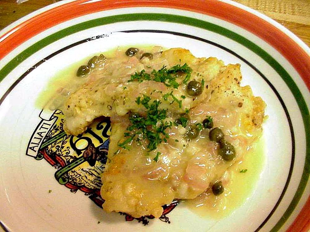 Jose Mier favorite Chicken piccata with lemon, capers and parsley in Sun Valley kitchen
